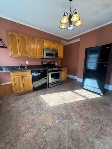 45 Broad Street, Unit 2 Salem, MA 01970 - Photo 3 of 16 a kitchen with stove and cabinets