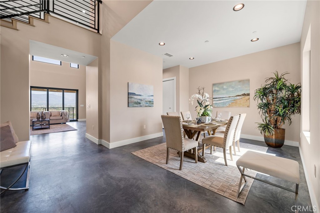 2380 Scenic Ridge Drive Chino Hills, CA 91709 - Photo 12 of 67 a view of a dining room with furniture and a potted plant
