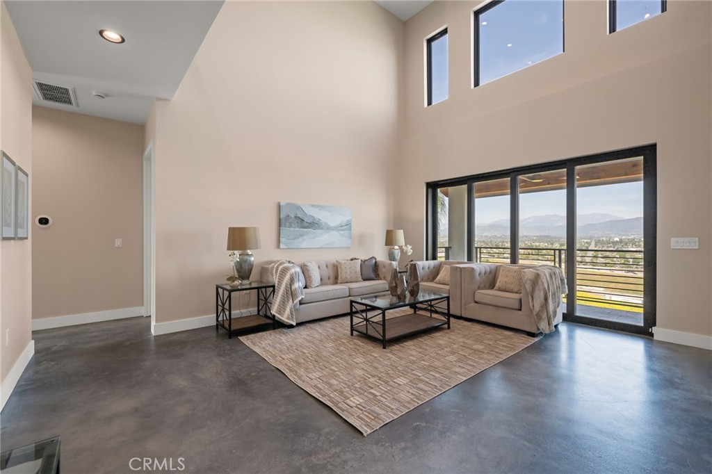 2380 Scenic Ridge Drive Chino Hills, CA 91709 - Photo 15 of 67 a living room with furniture and a large window
