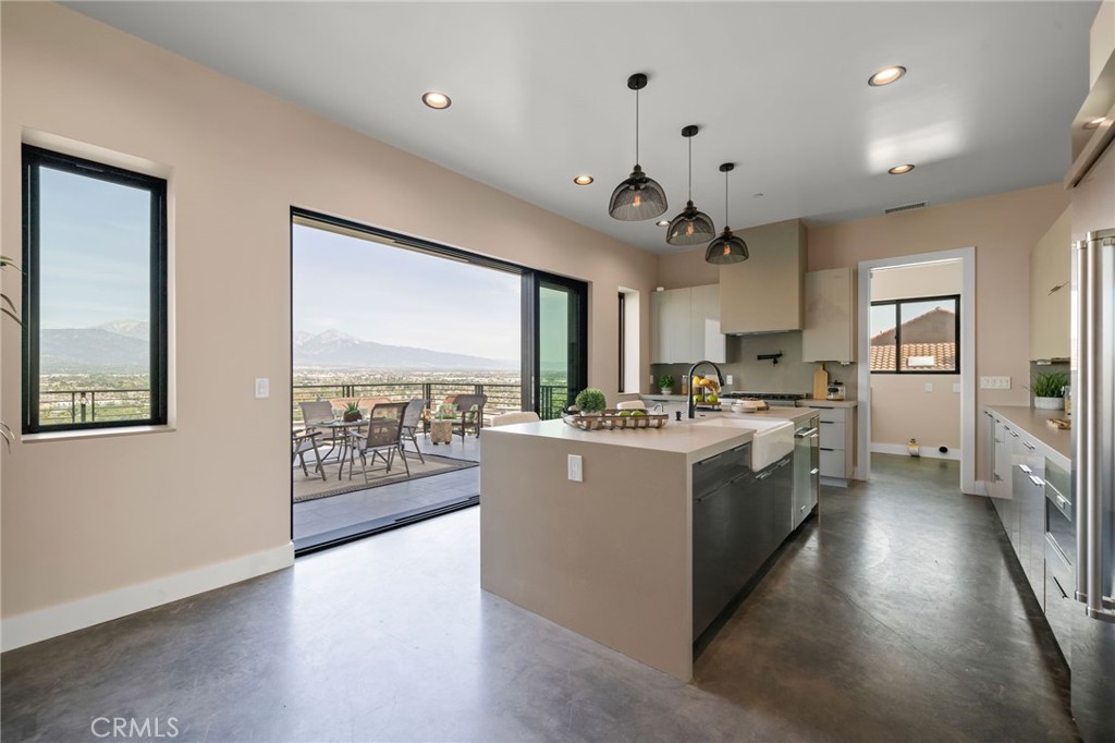 2380 Scenic Ridge Drive Chino Hills, CA 91709 - Photo 22 of 67 a view of a kitchen with fridge and wooden floor