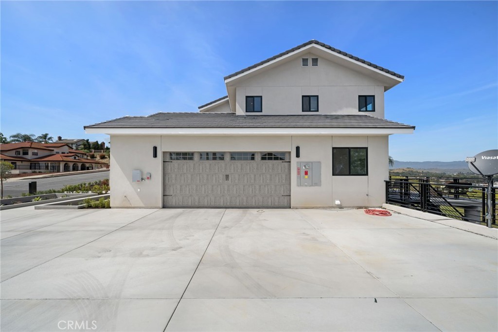 2380 Scenic Ridge Drive Chino Hills, CA 91709 - Photo 4 of 67 a view of house with yard and garage