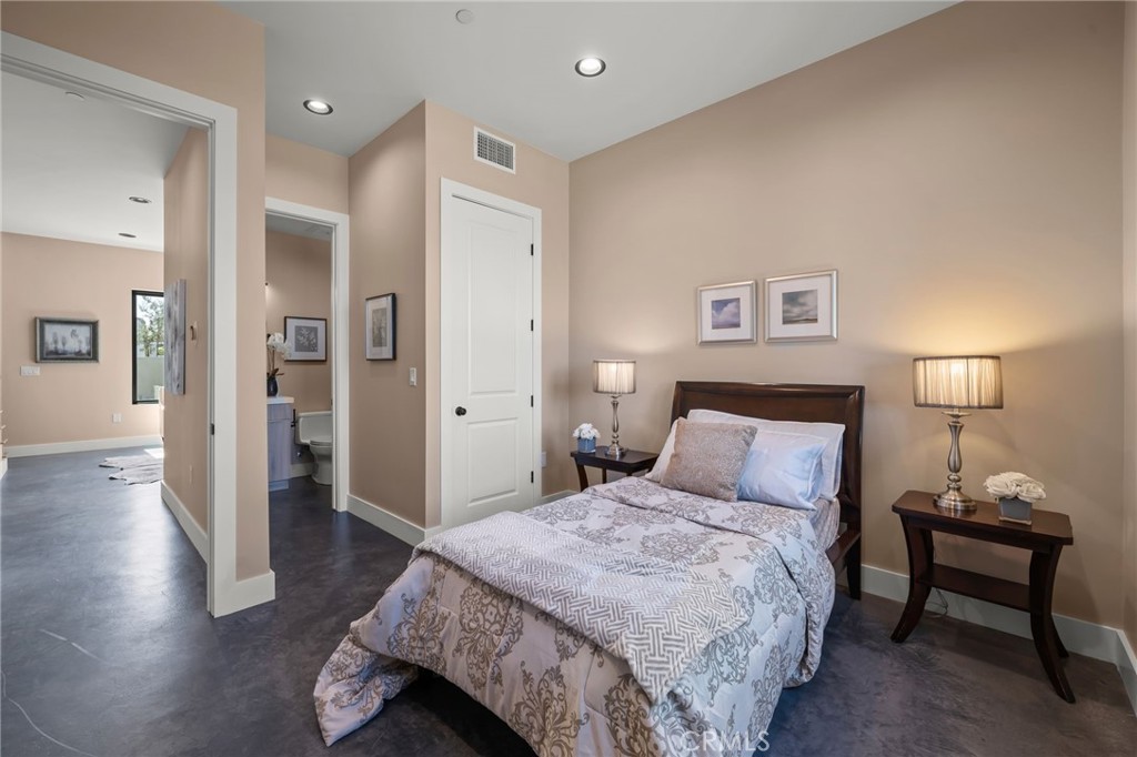 2380 Scenic Ridge Drive Chino Hills, CA 91709 - Photo 45 of 67 a bedroom with a bed and wooden floor