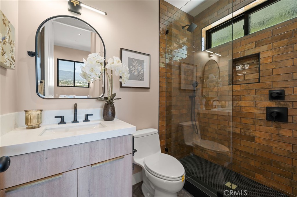 2380 Scenic Ridge Drive Chino Hills, CA 91709 - Photo 47 of 67 a bathroom with a sink a toilet and shower