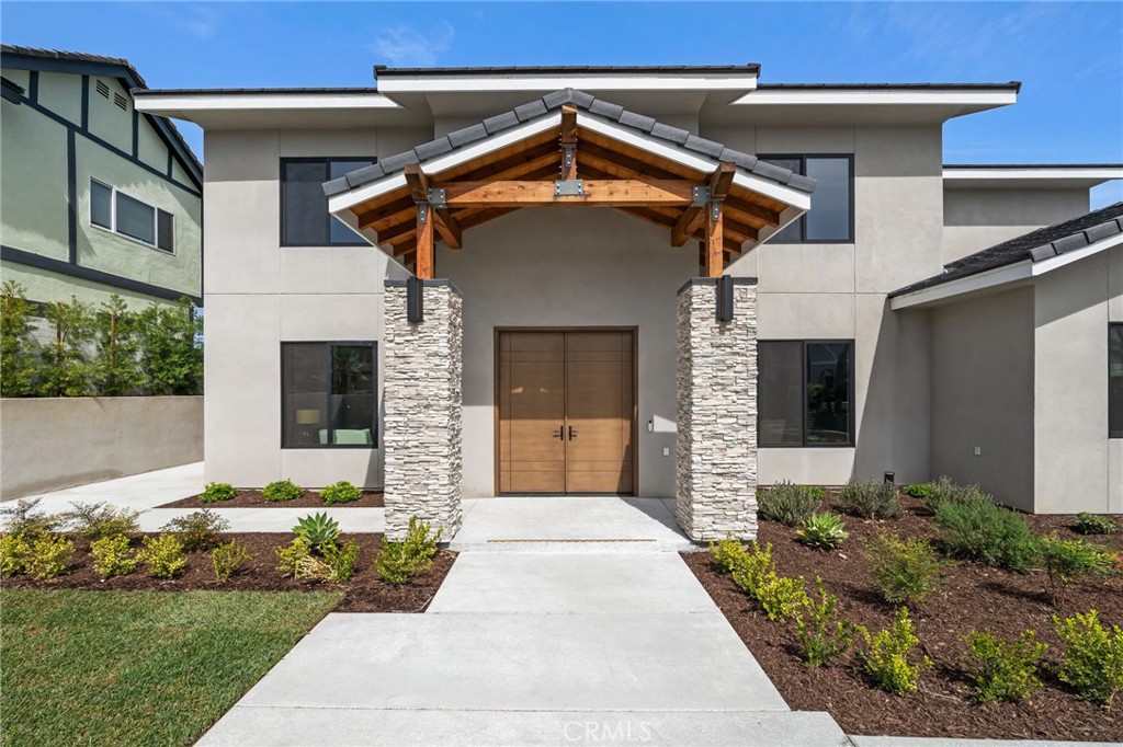 2380 Scenic Ridge Drive Chino Hills, CA 91709 - Photo 6 of 67 a front view of a house with garden