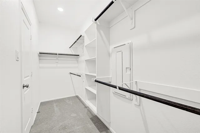 a view of a hallway with staircase