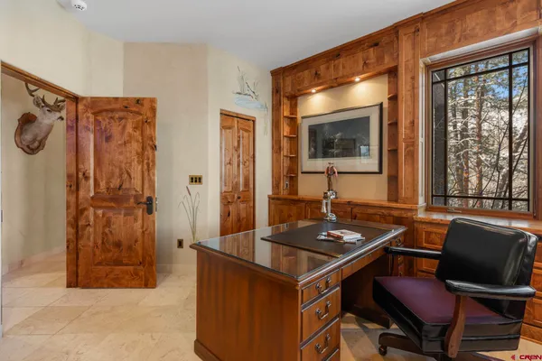 a room with furniture and window