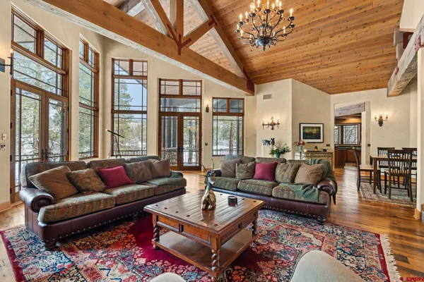 a living room with furniture or couch and a table