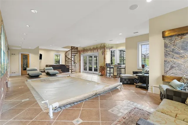 a living room with furniture and a table