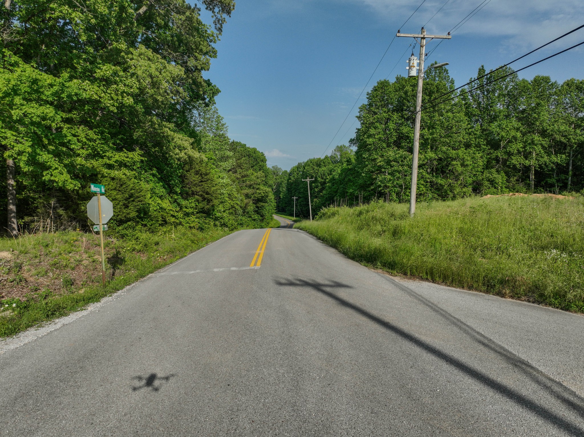 887 Waterloo Road Westpoint, TN 38486 - Photo 11 of 11 a view of a street with a small yard