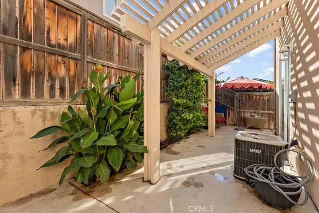 a potted plant sitting in front of a building
