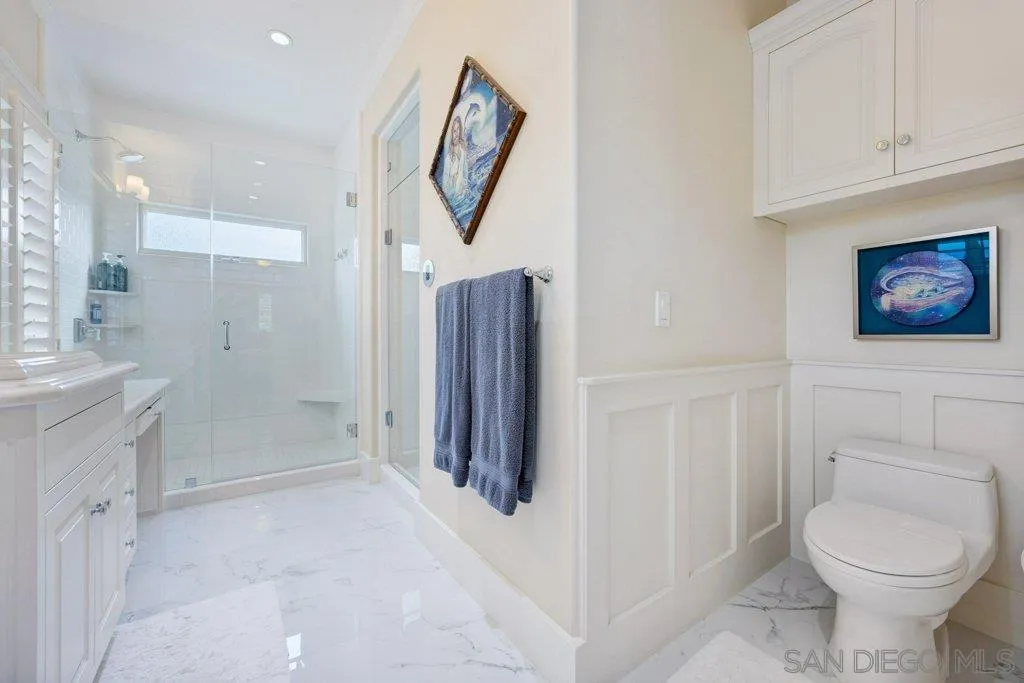 603 J Avenue Coronado, CA 92118 - Photo 16 of 22 a bathroom with a toilet sink and shower