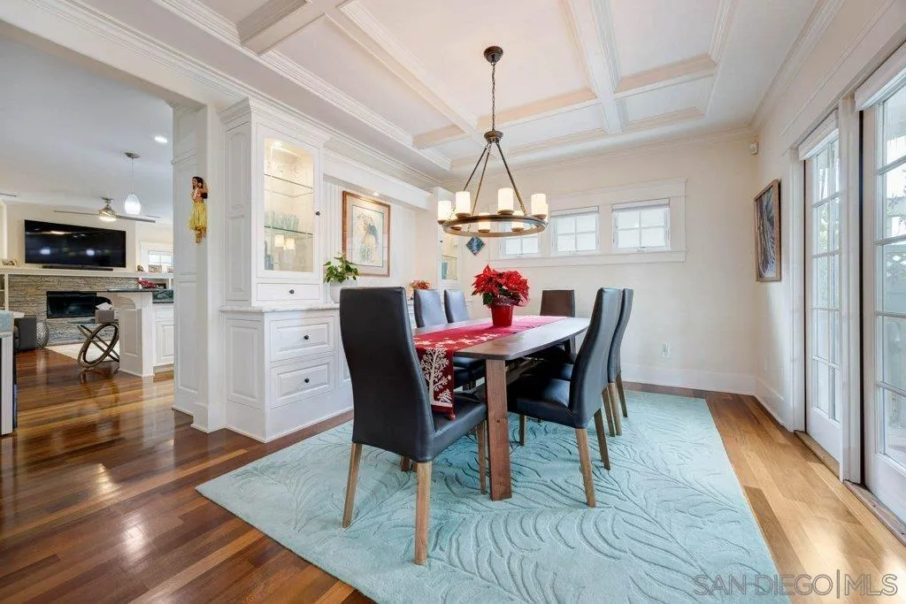 603 J Avenue Coronado, CA 92118 - Photo 19 of 22 a view of a dining room with furniture window and wooden floor
