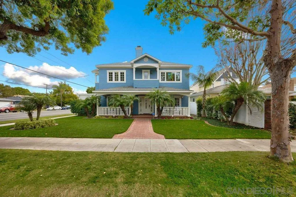 603 J Avenue Coronado, CA 92118 - Photo 20 of 22 a front view of a house with a yard and garage