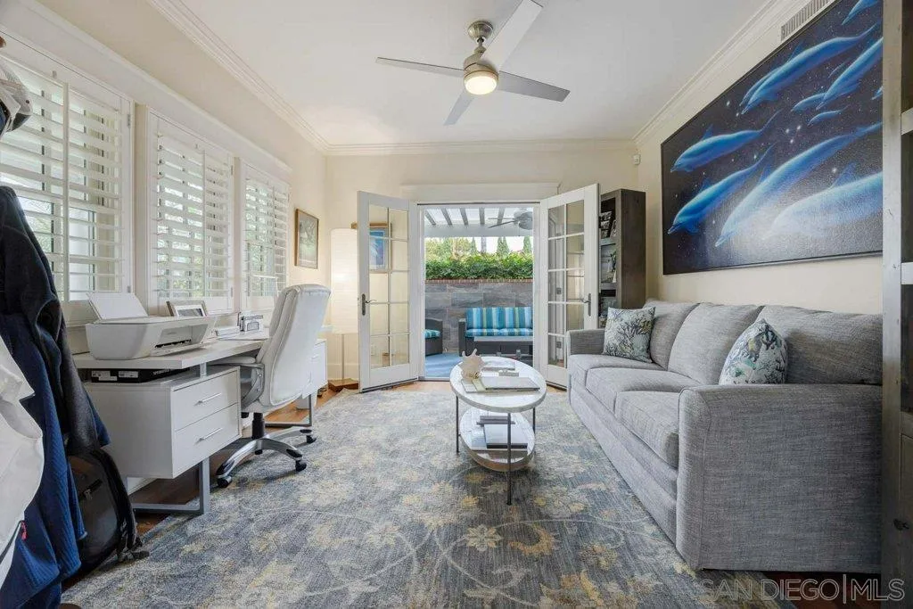 603 J Avenue Coronado, CA 92118 - Photo 7 of 22 a view of a livingroom with workspace and a window