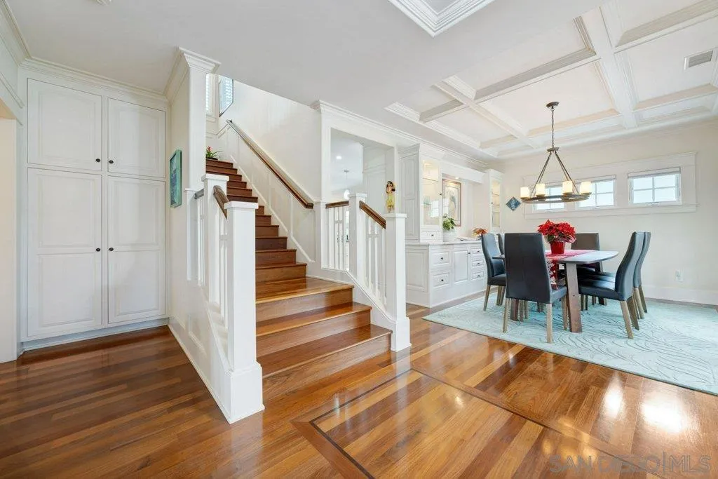 603 J Avenue Coronado, CA 92118 - Photo 10 of 22 a view of a dining room with furniture window and wooden floor