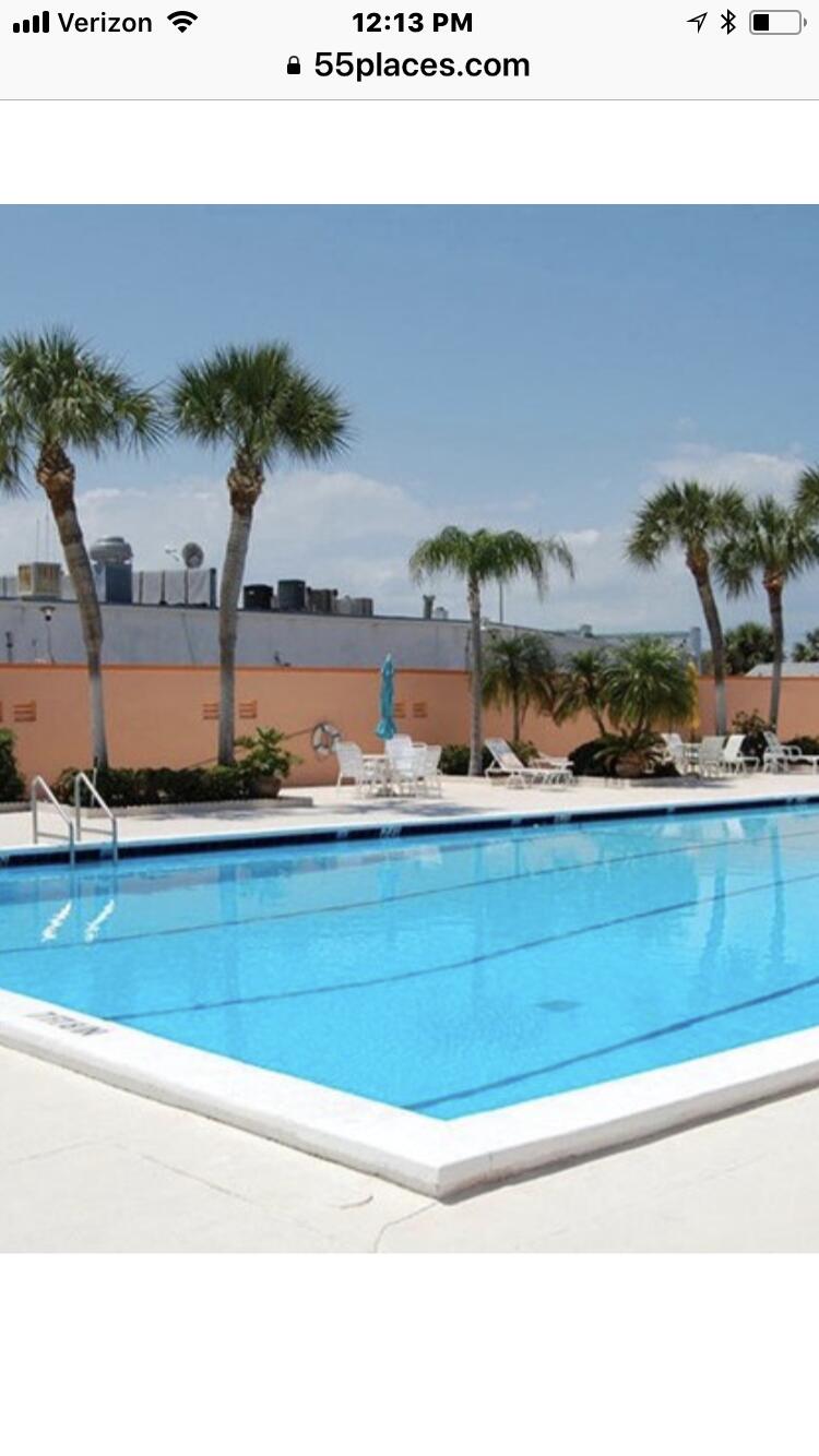 1225 Carlton Court, Unit 202 Fort Pierce, FL 34949 - Photo 12 of 15 a view of a lake