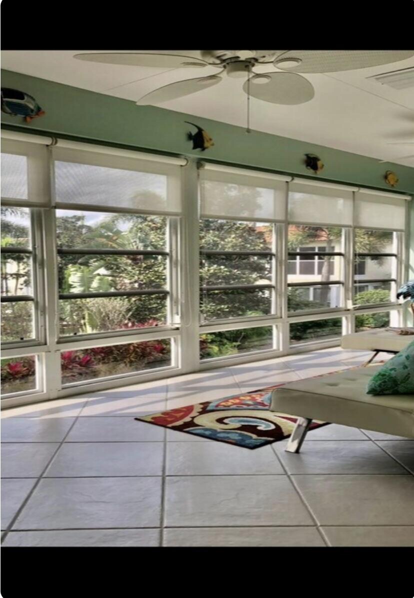 1225 Carlton Court, Unit 202 Fort Pierce, FL 34949 - Photo 9 of 15 a view of a living room and window
