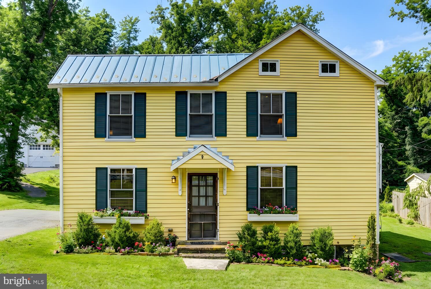 1911 Monkton Road Monkton, MD 21111 - Photo 4 of 35 a front view of a house with garden