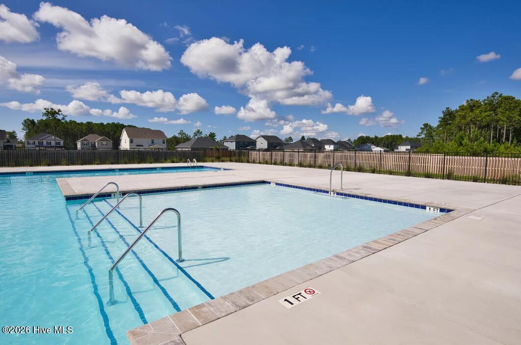 878 Stormy Gale Lane Holly Ridge, NC 28445 - Photo 49 of 54 Pool - 1' Area Ground Viewe