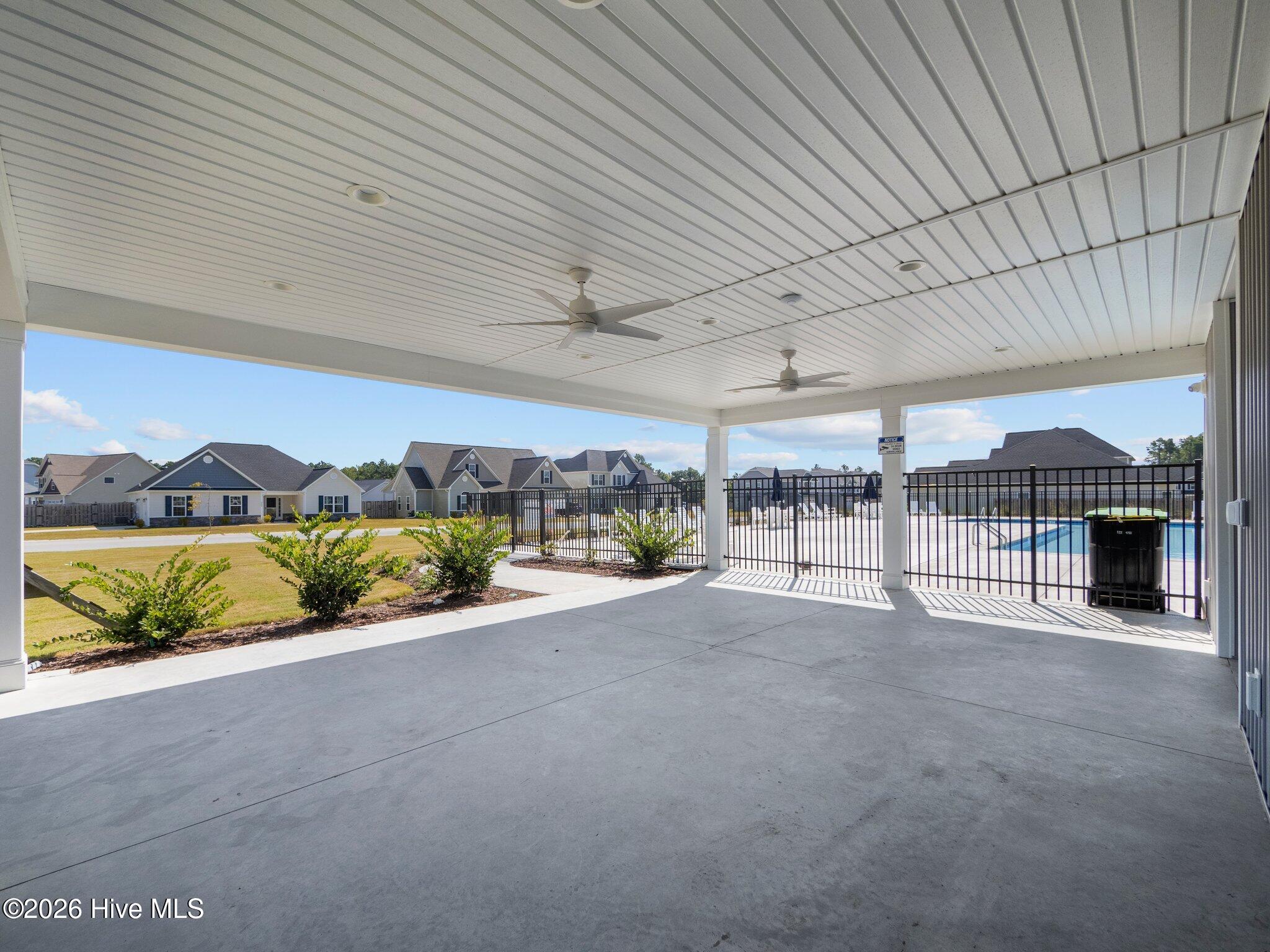 878 Stormy Gale Lane Holly Ridge, NC 28445 - Photo 51 of 54 Pool - Covered Patio Area Outside of Gat
