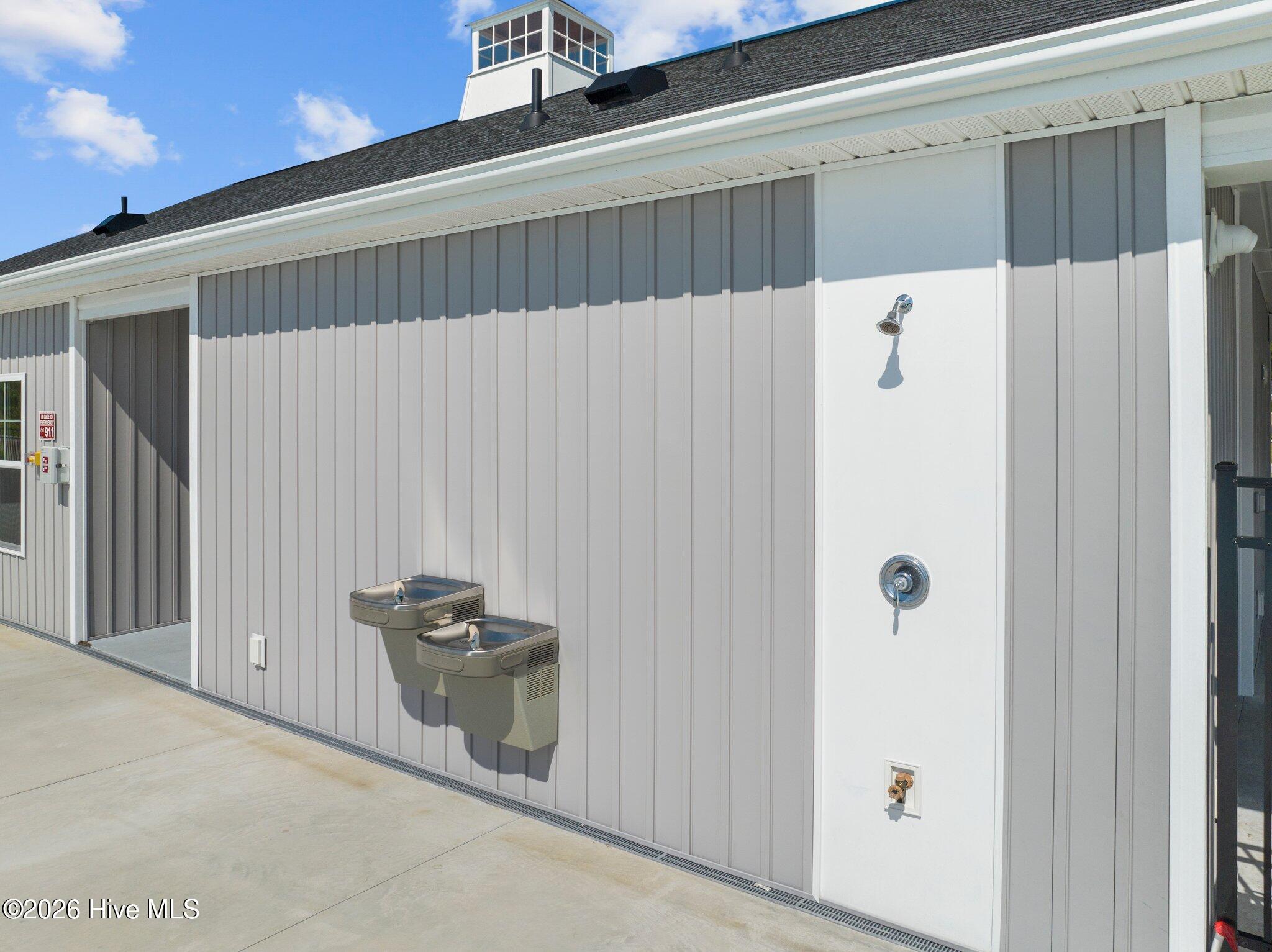 878 Stormy Gale Lane Holly Ridge, NC 28445 - Photo 52 of 54 Pool - Shower & Drinking Fountain