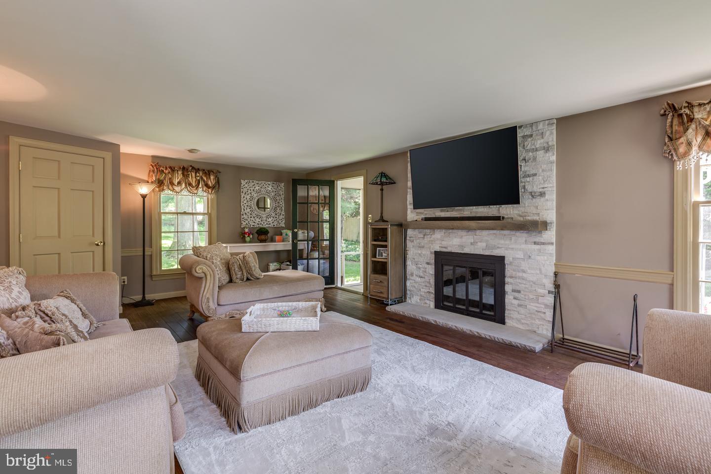 121 Haines Drive Moorestown, NJ 08057 - Photo 6 of 49 Living room featuring newly tiled fireplace