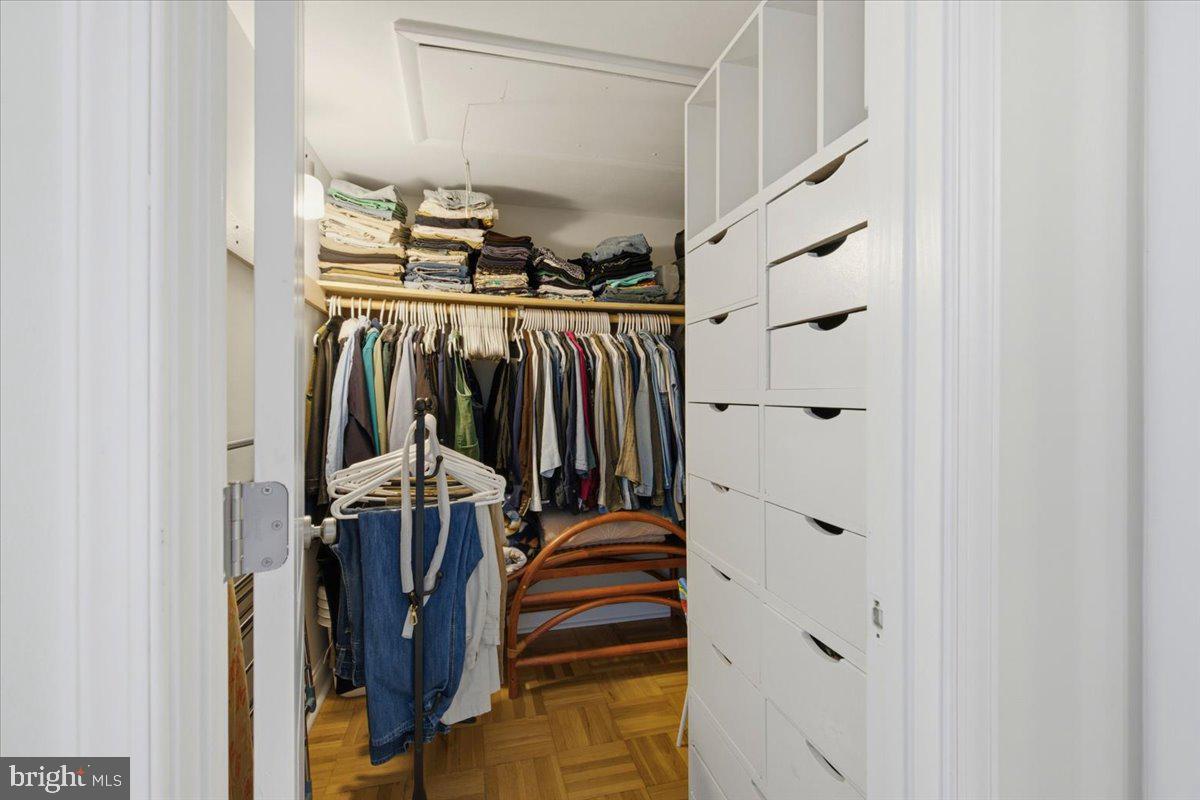 700 7th Street Southwest, Unit 827 Washington, DC 20024 - Photo 7 of 32 Organized closet with ample storage.