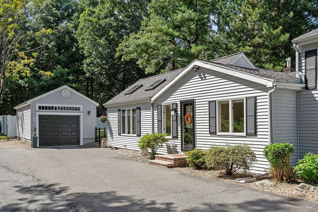 65 Gould Road Andover, MA 01810 - Photo 3 of 42 a front view of a house with garden
