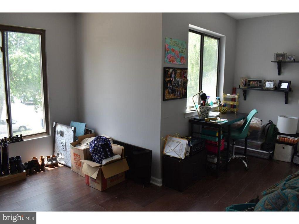33 Buttonwood Road Voorhees, NJ 08043 - Photo 14 of 14 a living room with furniture and a window