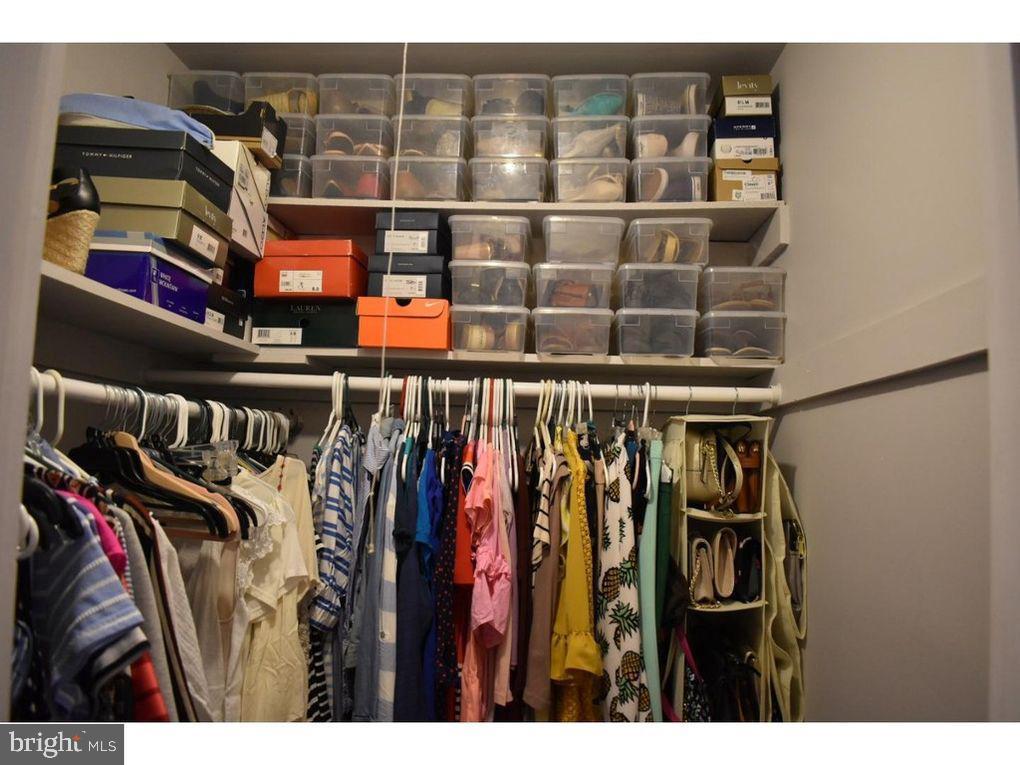 33 Buttonwood Road Voorhees, NJ 08043 - Photo 4 of 14 a view of walk in closet with clothes and shoes