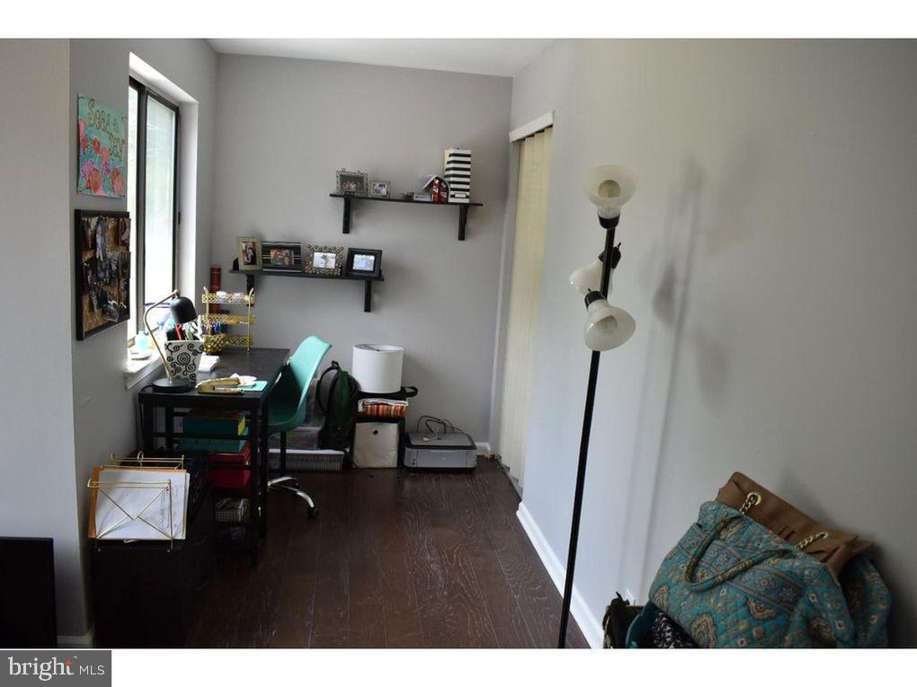 33 Buttonwood Road Voorhees, NJ 08043 - Photo 5 of 14 a living room with furniture and wooden floor