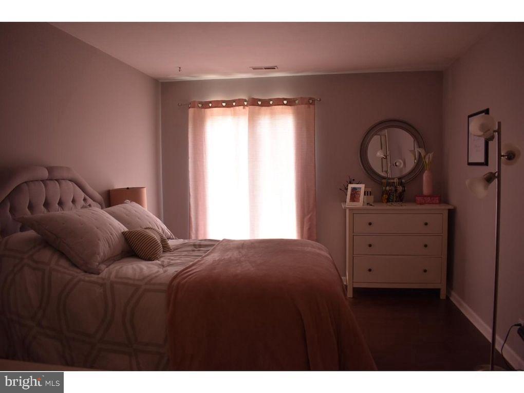 33 Buttonwood Road Voorhees, NJ 08043 - Photo 7 of 14 a bedroom with a bed and a closet