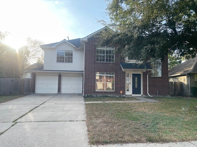 3807 Timber Rail Drive Humble, TX 77396 - Photo 1 of 13 front view of a house with a yard