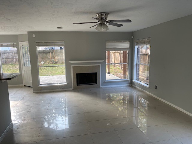 3807 Timber Rail Drive Humble, TX 77396 - Photo 2 of 13 a living room with furniture and a fireplace
