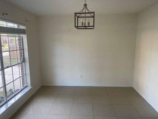 3807 Timber Rail Drive Humble, TX 77396 - Photo 3 of 13 an empty room with windows