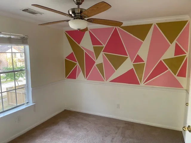 an room with a bed and a yard