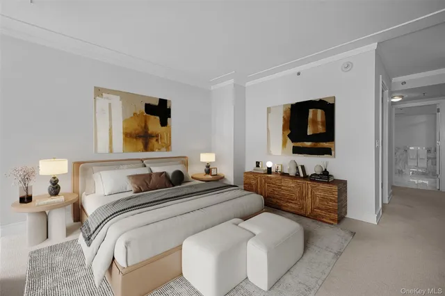 a bedroom with a bed and a flat screen television