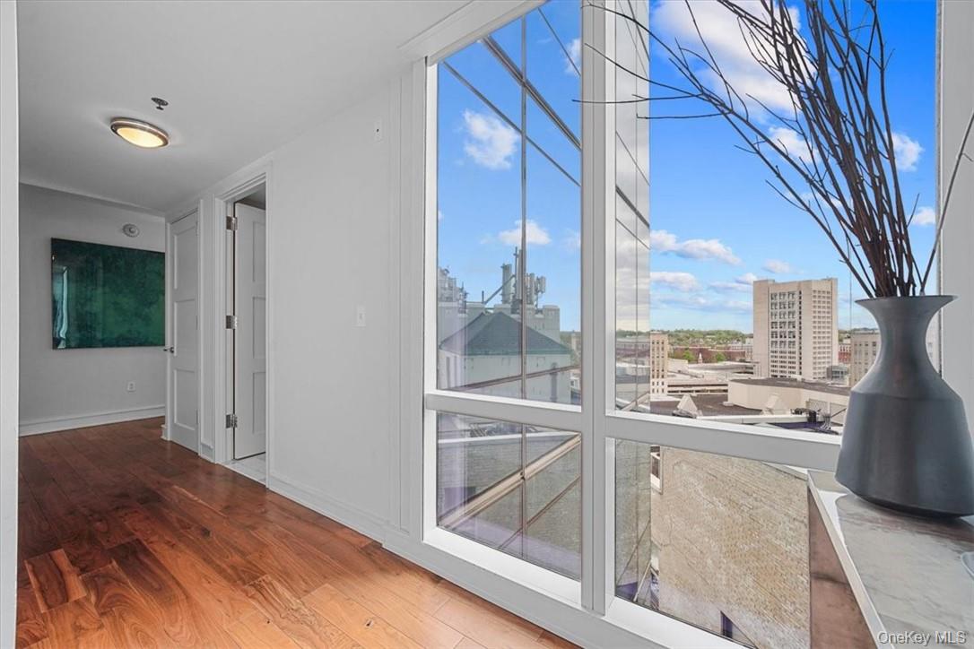 1 Renaissance Square, Unit 14D White Plains, NY 10601 - Photo 2 of 24 a view of a living room hardwood and a floor to ceiling window