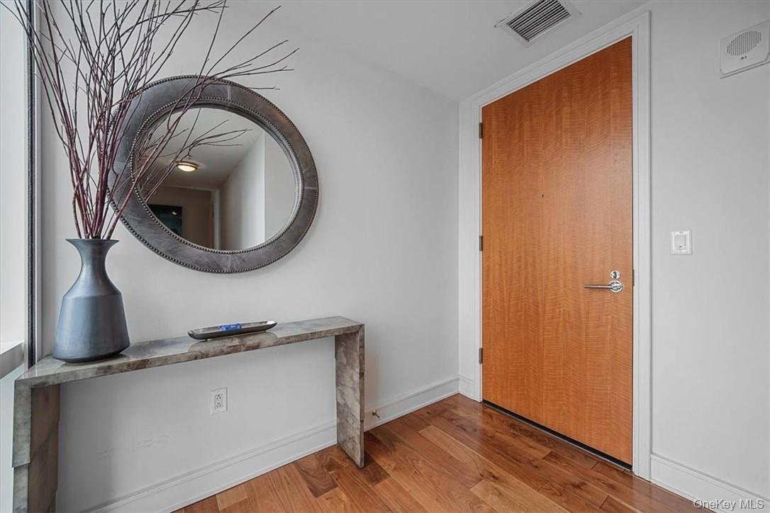 1 Renaissance Square, Unit 14D White Plains, NY 10601 - Photo 3 of 24 a close view of a kitchen with a sink and a washer