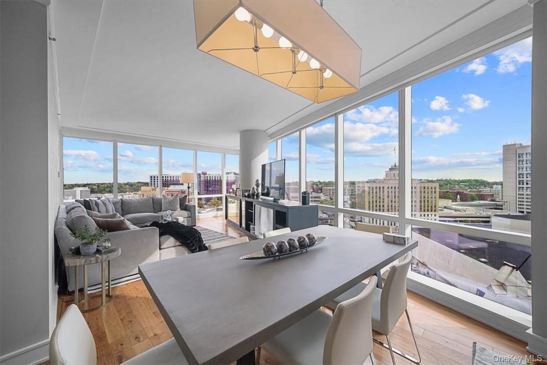 1 Renaissance Square, Unit 14D White Plains, NY 10601 - Photo 9 of 24 a view of a workspace with furniture and floor to ceiling window