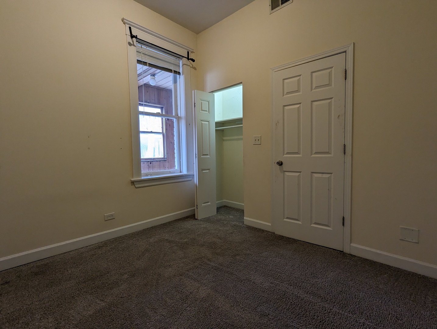 2134 West Concord Place, Unit 1R Chicago, IL 60647 - Photo 13 of 18 an empty room with windows