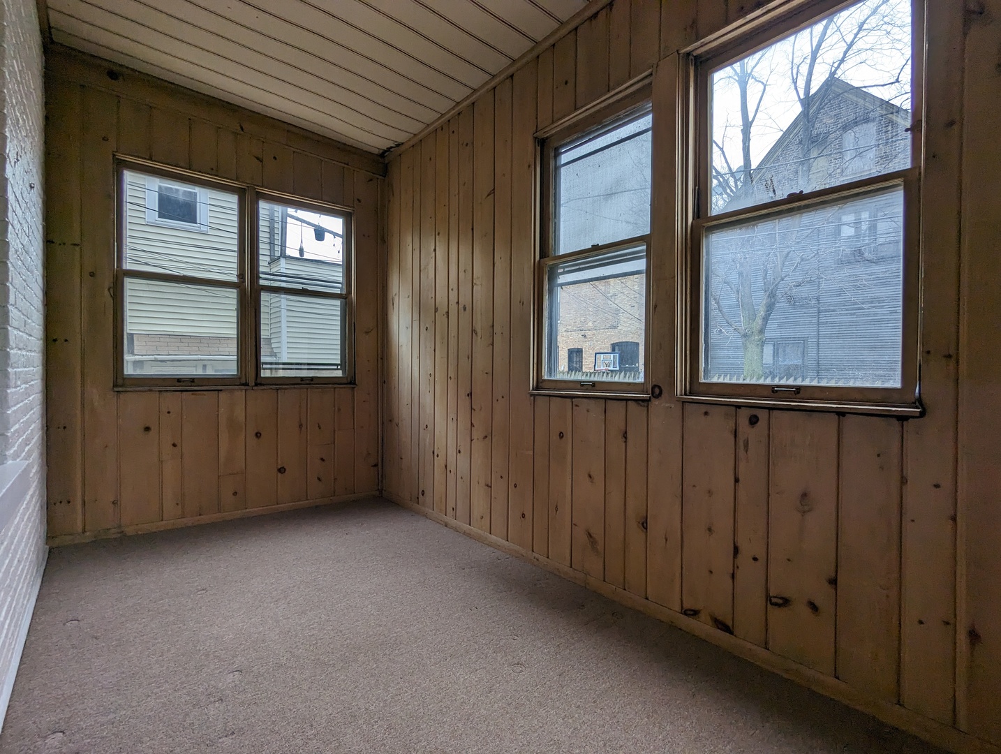 2134 West Concord Place, Unit 1R Chicago, IL 60647 - Photo 16 of 18 an empty room with windows
