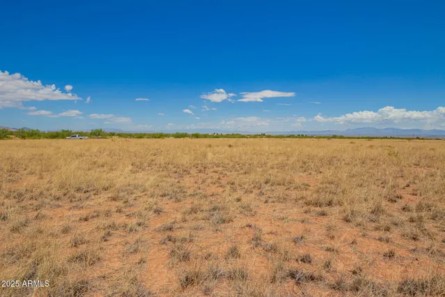 a view of beach and yard