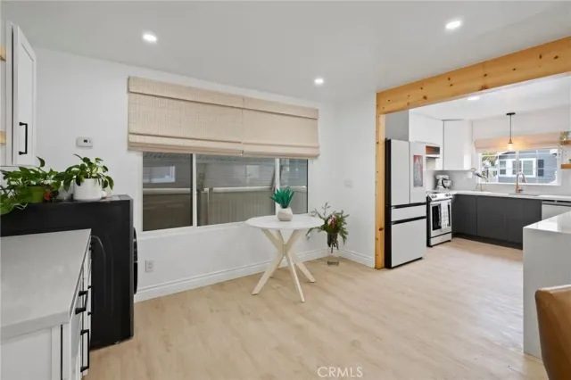 a view of outdoor space with wooden floor and windows