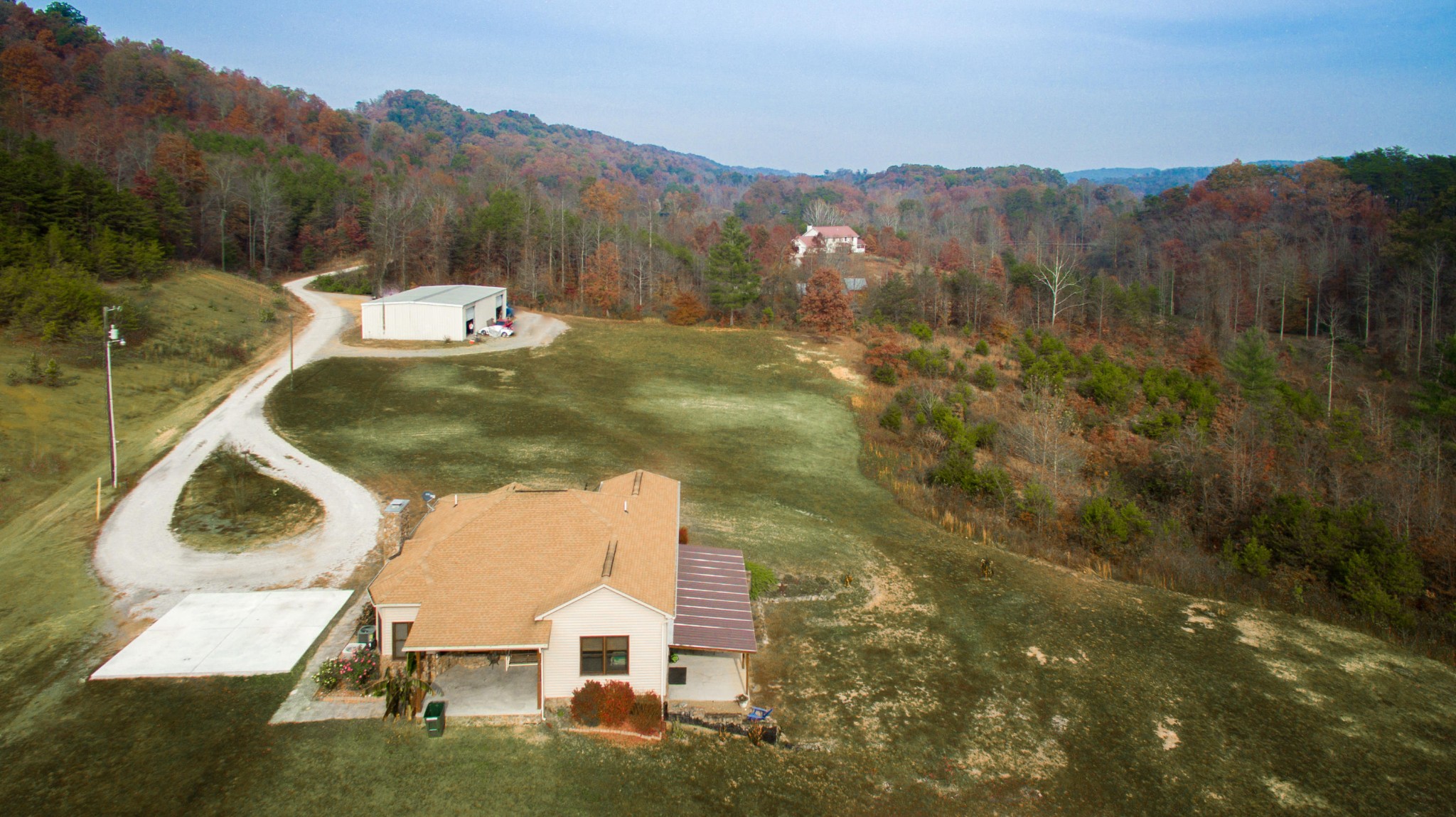 254 Logan Lane Heiskell, TN 37754 - Photo 2 of 39 a view of a house with a mountain in the background