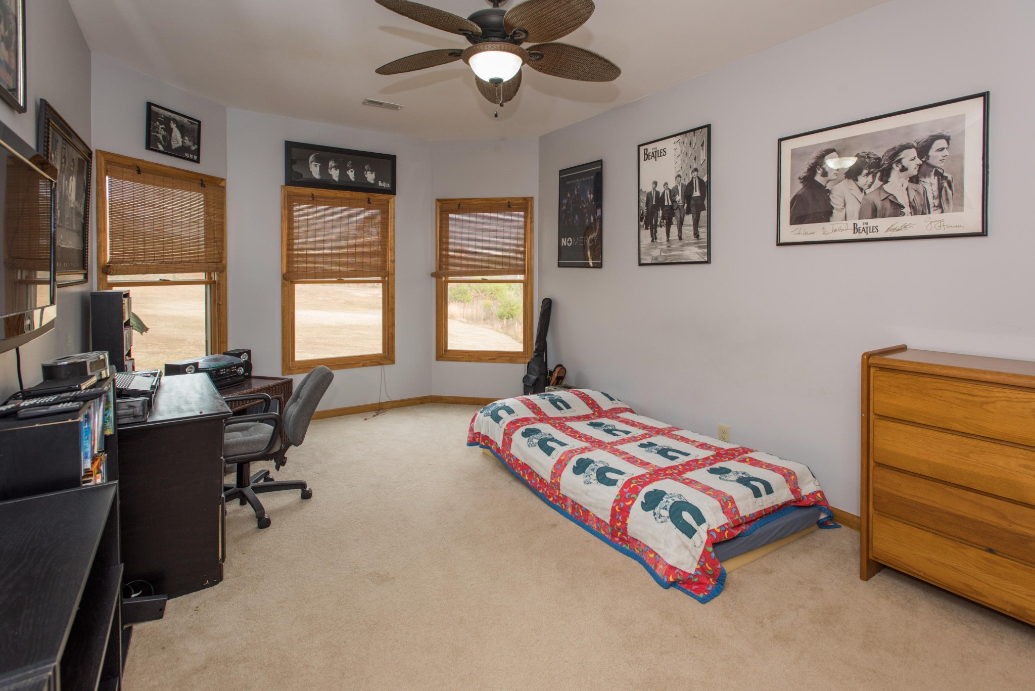 254 Logan Lane Heiskell, TN 37754 - Photo 24 of 39 a bedroom with a bed and a chandelier