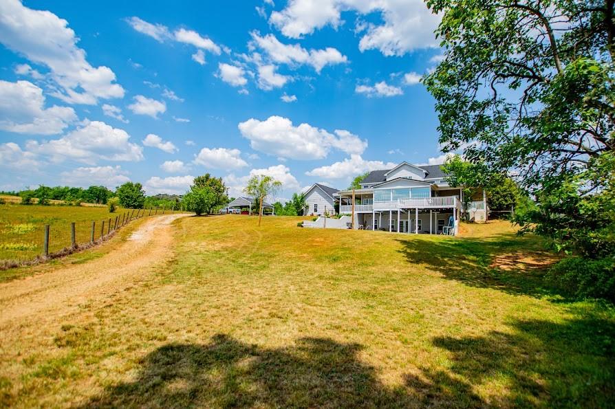 575 Liberty Church Road Carrollton, GA 30116 - Photo 73 of 95 a view of a swimming pool with an outdoor seating