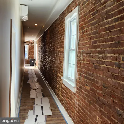 a hallway with windows