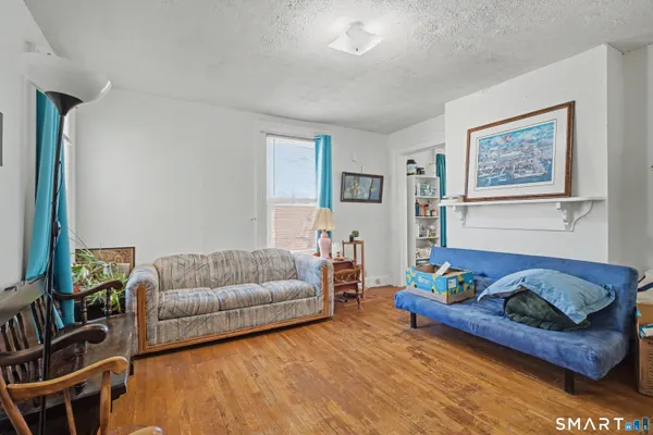 a living room with furniture and a couch