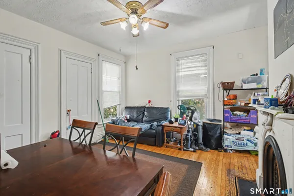 a living room with furniture and a window